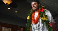 An Oregon man who quit his job to set sail with his cat arrives to cheering fans in Hawaii
