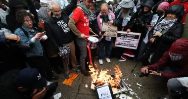 Anti-Israel protesters torch diplomas outside Columbia University on graduation day