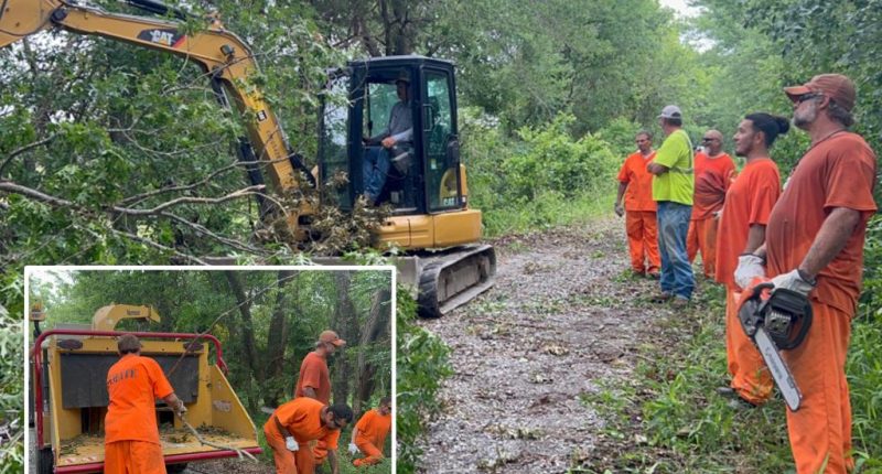 'Army of orange' inmates rescue mother and 3 children who were stranded at home following destructive Oklahoma tornado
