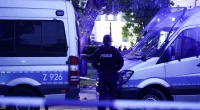 Ax attack at university leaves 1 dead, 1 injured as police reportedly find severed head at scene