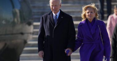 Joe and Jill Biden holding hands after the 2025 presidential inauguration.