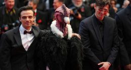 Bird man on red carpet leaves Cannes squawking