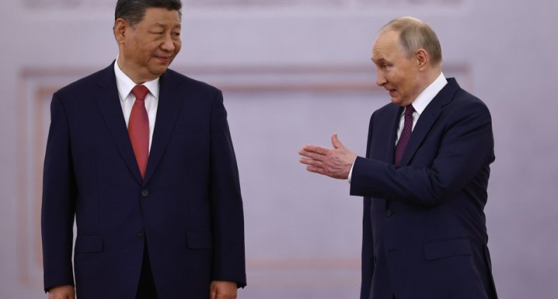 Presidents Xi Jinping and Vladimir Putin at a welcoming ceremony in Moscow.