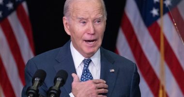 President Biden speaking at a conference.