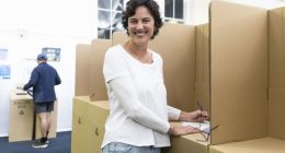 PERTH, AUSTRALIA - MAY 03: Kate Chaney, Independent Federal member for Curtin is places her vote on May 03, 2025 in Perth, Australia. Australians headed to the polls on Saturday for the 2025 federal election, where all 150 seats in the House of Representatives and 40 of 76 Senate seats are up for grabs. This election is especially consequential due to a tightly contested race, with cost-of-living pressures, affordable housing, and energy policy dominating the campaign. Though most polls indicate