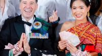 Graeme Davidson and his bride at their Thai wedding ceremony.