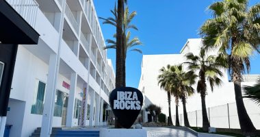 Ibiza Rocks Hotel entrance with palm trees.
