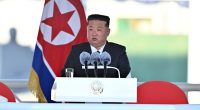 Kim Jong Un observing military exercises.