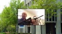 Case over gun brandished during Zoom meeting settles