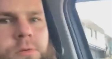 Man arrested after allegedly firing gun from moving car