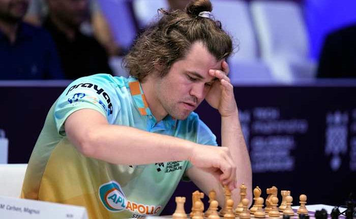 Chess grandmaster Magnus Carlsen faces showdown against 'the world.' Will it end in a draw?