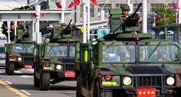 Taiwanese armored vehicles on a road.