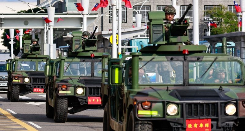 Taiwanese armored vehicles on a road.