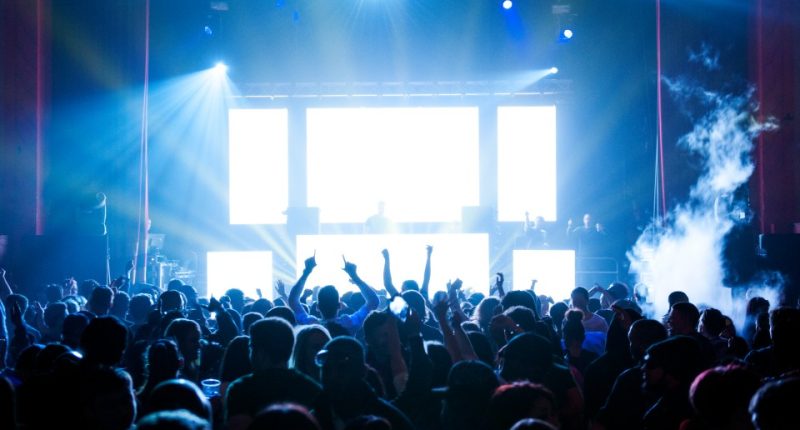 Large crowd at a music concert.