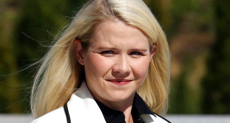 Convicted Elizabeth Smart kidnapper flashes huge smile in new mugshot for Utah's sex offender registry