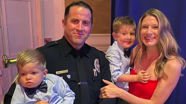 Cop surprises friends as they arrive to tell his wife he'd been shot