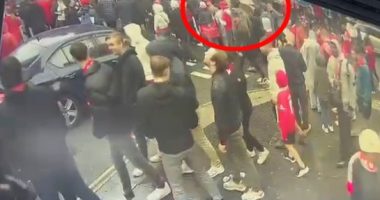 Security camera footage of a car driving into a crowd of Liverpool fans.