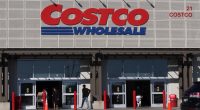 People entering and exiting a Costco Wholesale store.