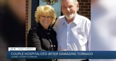 Photo of a couple hospitalized after a tornado.