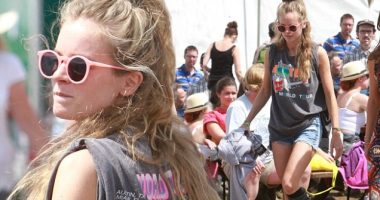 Cressida Bonas sports messy bedhead hair and hotpants at Glastonbury