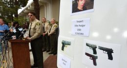 Photo of a press conference where law enforcement officials display photos of Elliot Rodger and the weapons used in the Isla Vista shooting.