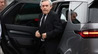 Gordon Brown arriving at Sir Tony Lloyd's funeral.