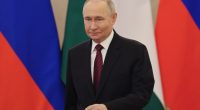 Vladimir Putin at a meeting in the Kremlin.