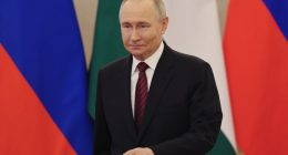 Vladimir Putin at a meeting in the Kremlin.