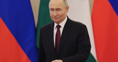Vladimir Putin at a meeting in the Kremlin.