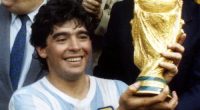 Diego Maradona holds up the World Cup trophy in 1986