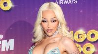 Doja Cat suffers plastic surgery disaster but begs fans not to notice