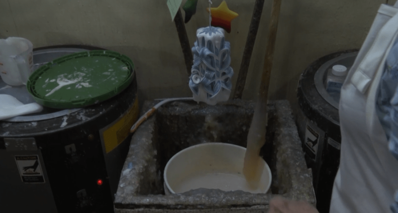 Dollywood candlemaker celebrates milestone along with park