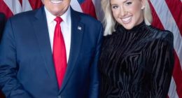 Savannah Chrisley and Donald Trump posing together.
