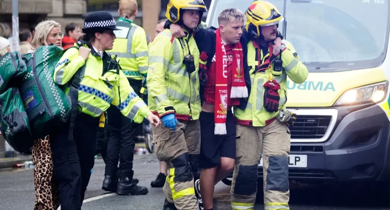 Dozens injured after driver plows through crowd of Liverpool soccer fans during victory parade