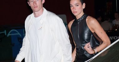 Dua Lipa sizzled in a leather black mini dress as she joined her fiancé Callum Turner for a date night in New York City on Friday