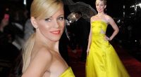 Elizabeth Banks in yellow gown at Hunger Games: Catching Fire premiere