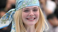 Elle Fanning looks 70s chic as she steps out in Cannes