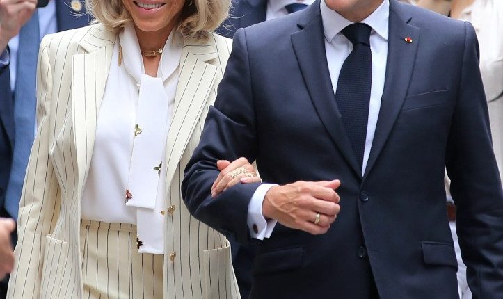 Emmanuel and Brigitte Macron arriving at the Hanoi University of Science and Technology.