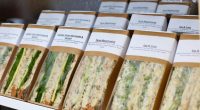 Assortment of individually packaged sandwiches.