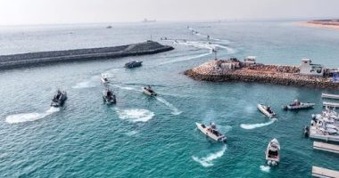This August 2023 photo released by the Iranian Revolutionary Guard shows speedboats during a drill in the Persian Gulf.