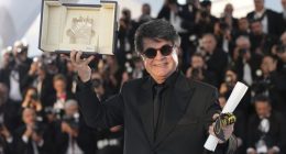 Formerly jailed Iranian filmmaker wins top Cannes award