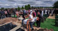 Funeral of 3 siblings killed in Russian strike underscores mounting toll on Ukrainian families