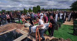 Funeral of 3 siblings killed in Russian strike underscores mounting toll on Ukrainian families