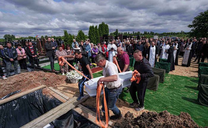 Funeral of 3 siblings killed in Russian strike underscores mounting toll on Ukrainian families