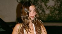 Hailey Bieber nearly spills out of daringly low-cut dress in Miami