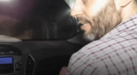 Man speaking in a car.