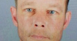 Mugshot of Christian Brueckner, suspect in Madeleine McCann's disappearance.