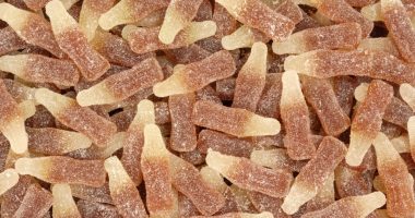 Many cola-bottle-shaped gummy candies.