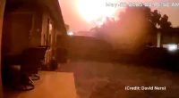 Screenshot of a large fire at night.