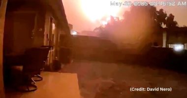 Screenshot of a large fire at night.